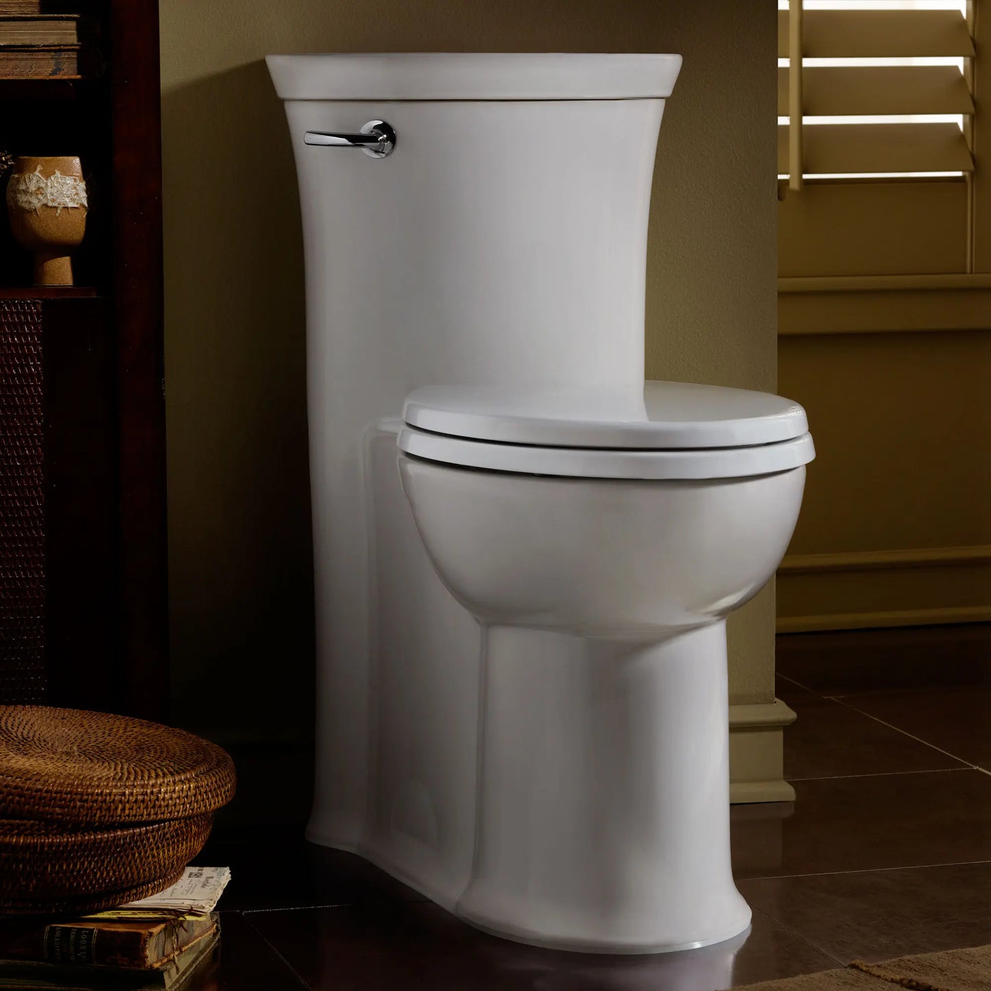 Tropic® One-Piece 1.28 gpf/4.8 Lpf Chair Height Elongated Toilet With Seat